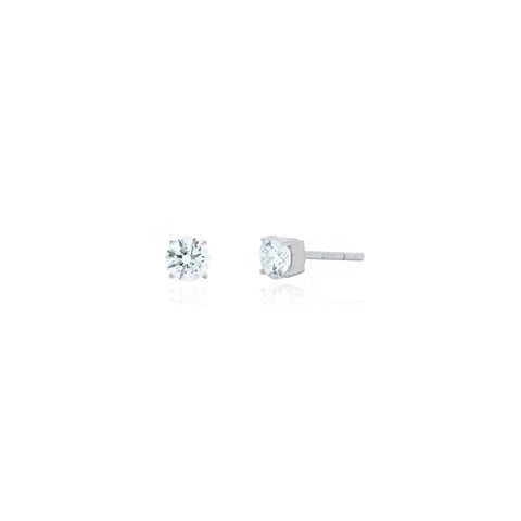 Pair of diamond stud earrings on a white background
