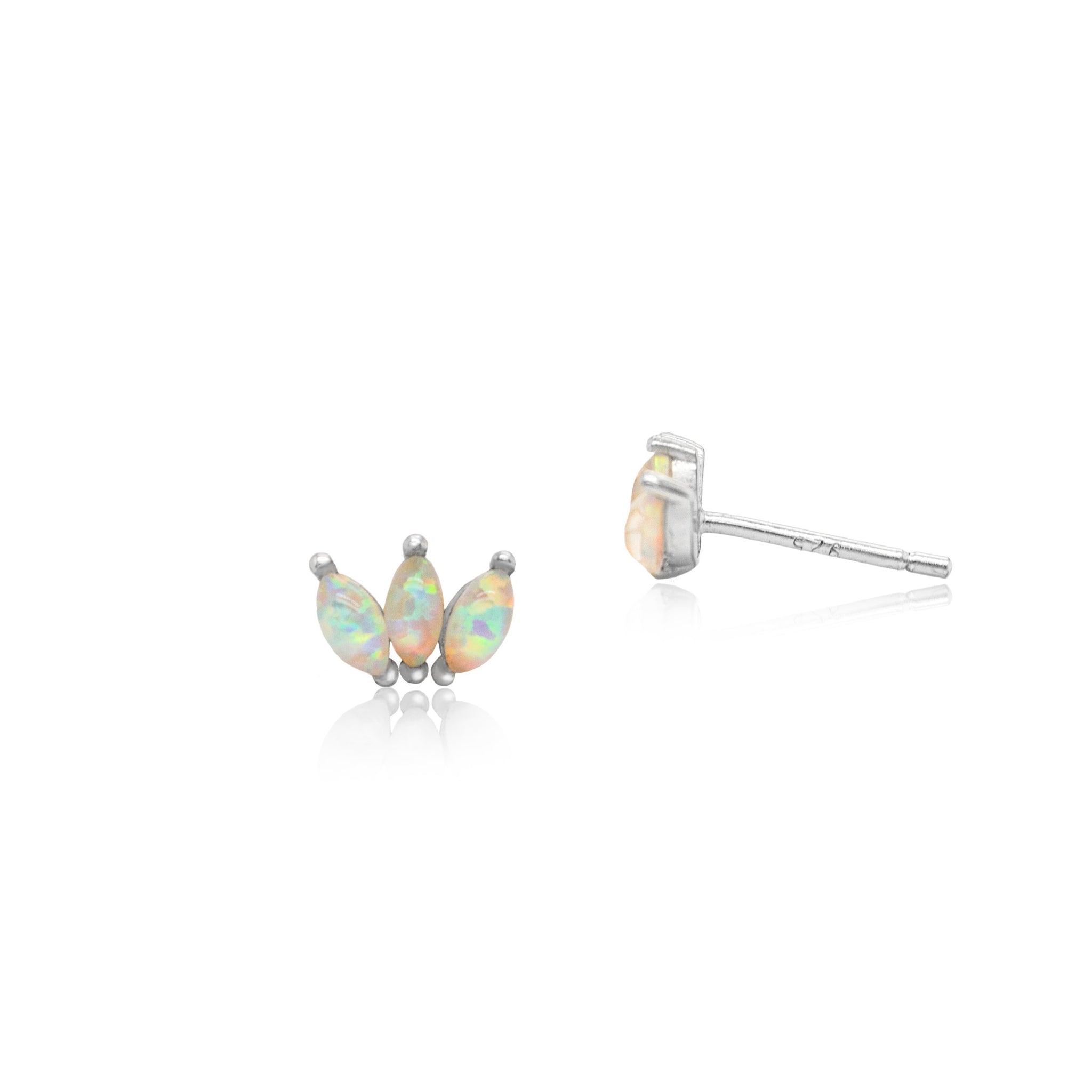 Pair of opal stud earrings on a white background