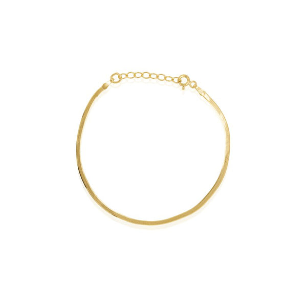 Gold bracelet on a white background