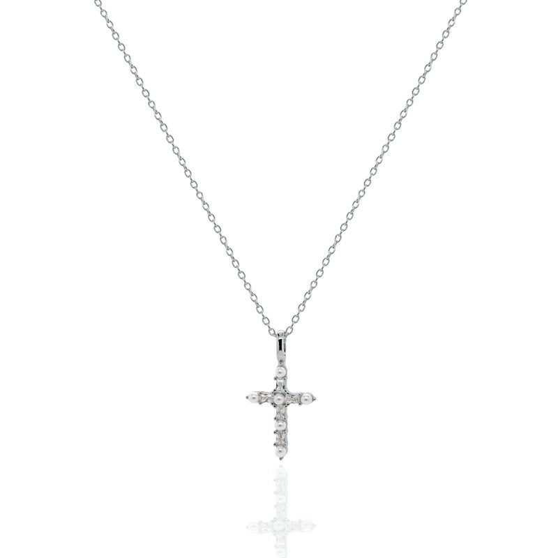 Silver cross necklace with small diamonds on a white background