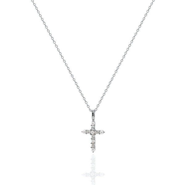 Silver cross necklace with small diamonds on a white background