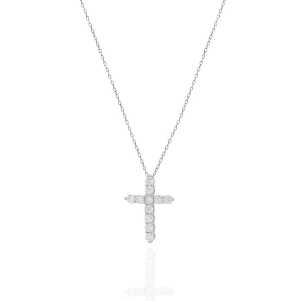 Diamond cross necklace on a white background
