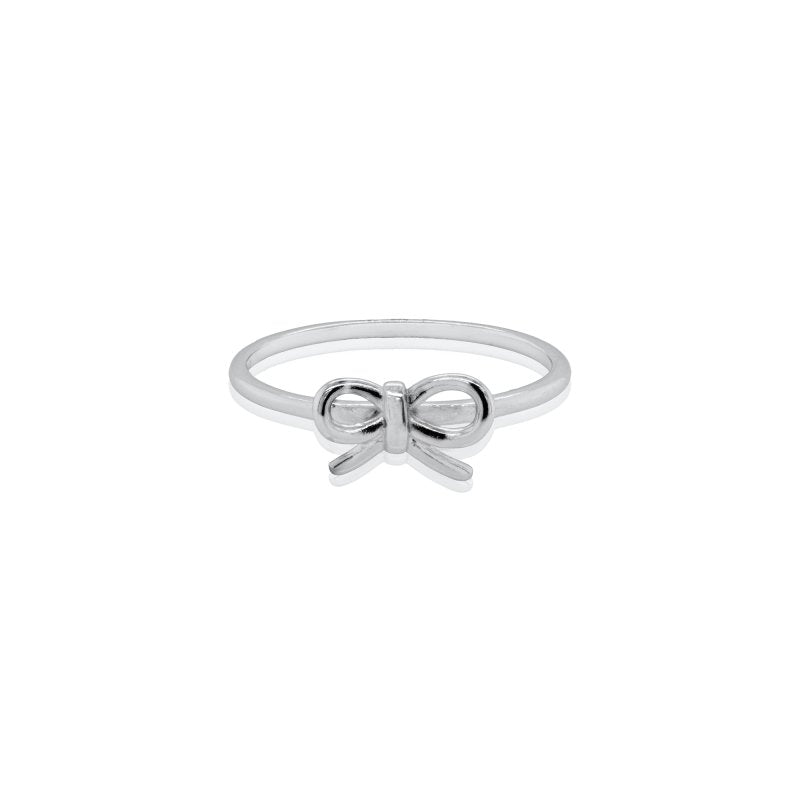 Silver bow-shaped ring on a white background