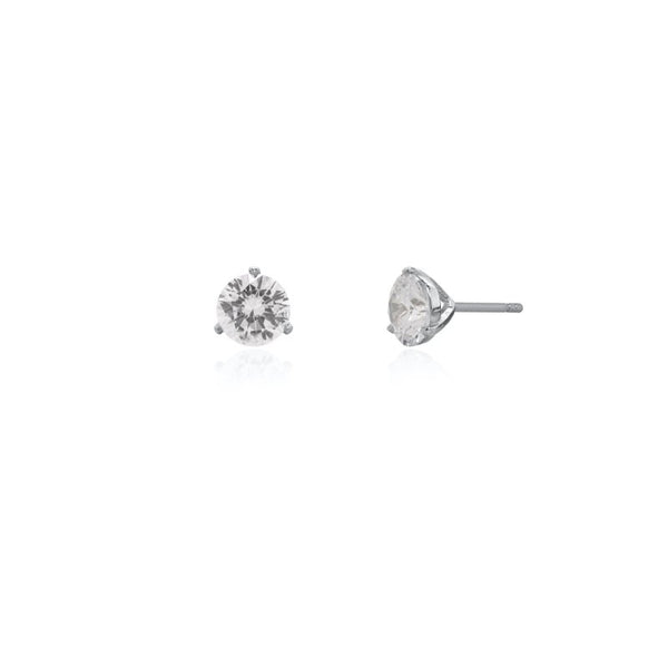 Pair of diamond stud earrings on a white background