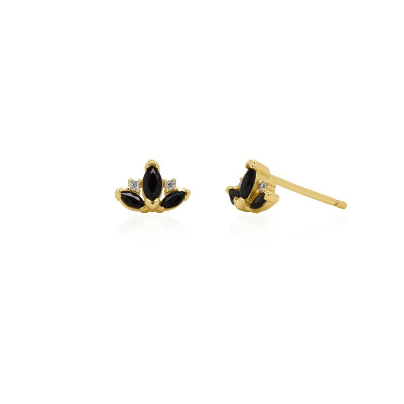 Gold and black earrings on a white background